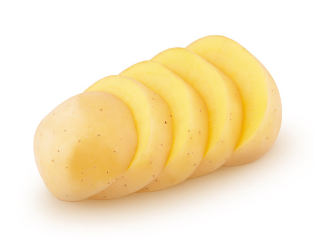 切片新鲜的整个绿色蔬菜西葫芦分离在白色的背景。图片下载