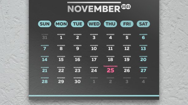 2021年11月的日历上有一个漂亮的黑色页面，上面写着感恩节的日期图片下载