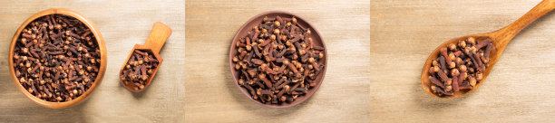 一套香料丁香(Syzygium aromaticum)在木制勺子和勺子，碗，粘土板上棕色木制背景。近,宏。平躺图片下载
