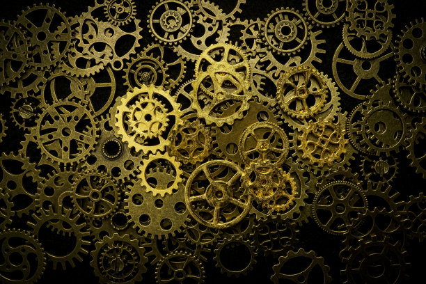 齿轮和手表在黑色背景金属车轮图片下载