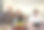 患有唐氏综合症的父亲、女儿和儿子坐在沙发上使用电子平板电脑。图片下载