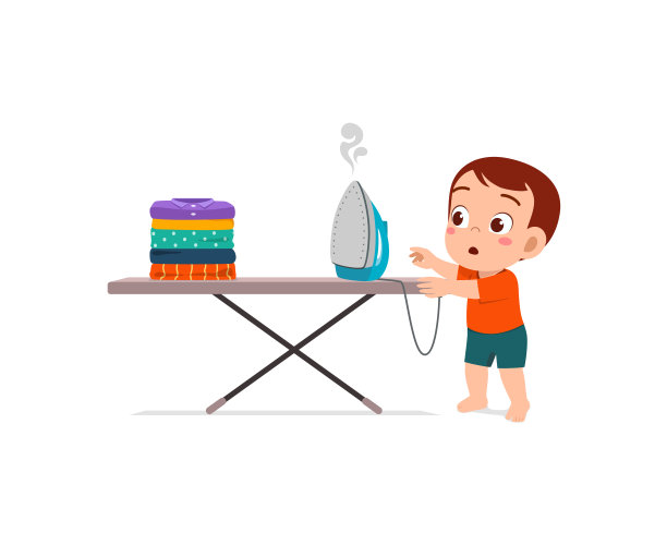 小婴儿好奇地摸热的电熨斗图片下载