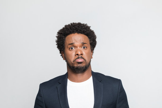 惊讶的年轻商人的大头照图片下载