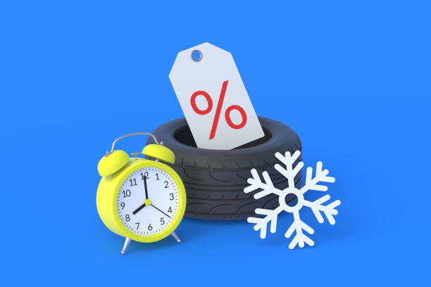 轮胎附近的雪花，闹钟和百分比符号的标签。特别优惠价。冬季车轮的热折扣。销售季节性的汽车零部件。促销，降低轮胎配件价格。三维渲染图片下载