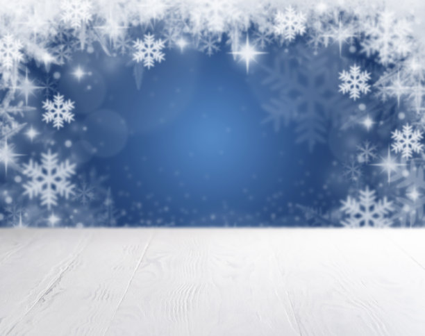 圣诞节背景与雪花和雪花的蓝色图片下载
