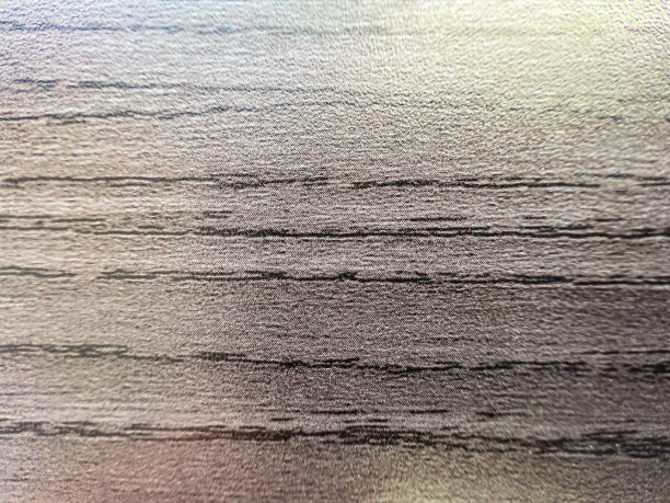 一幅浅棕色木材的宏观图片。图片下载