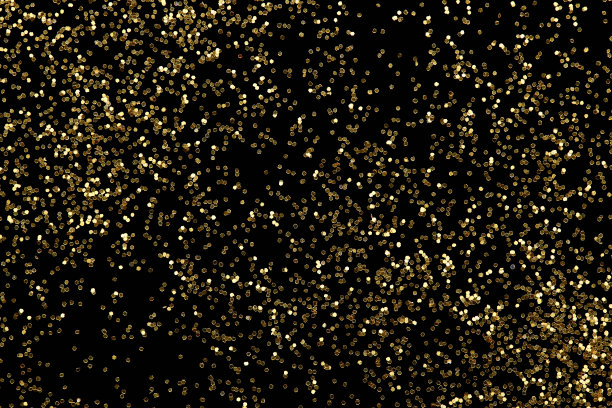 金色闪光纸屑抽象背景，金色尘埃奢华新年背景。图片下载