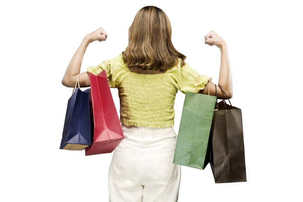 背面的亚洲妇女提着购物袋图片下载