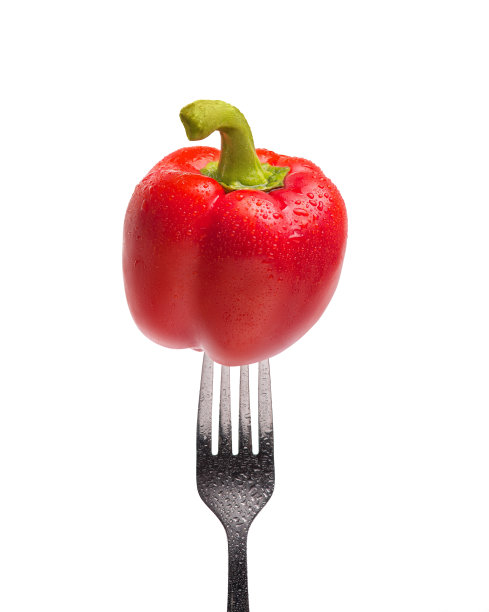 叉子上放着红甜椒图片下载