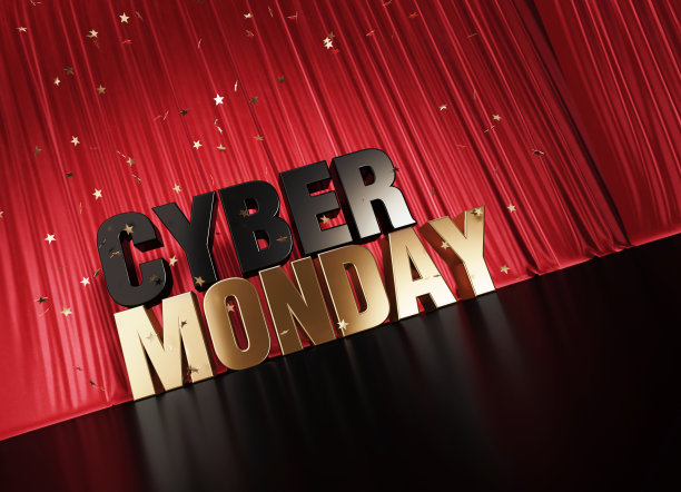 网络星期一概念-黑色和金色的网络星期一文本坐在红色窗帘下的星星形状的纸屑图片下载