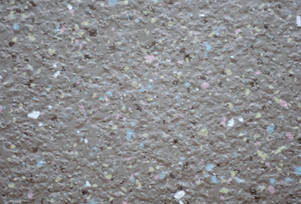 一块水泥墙的碎片，上面有蓝色、黑色和白色的小斑点。图片下载