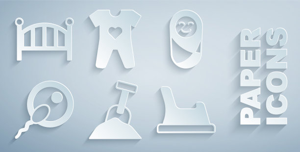 用沙子和铲子把刚出生的婴儿放在沙箱里图片下载