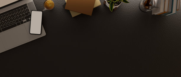 带有复制空间、笔记本电脑、智能手机模型和装饰的现代黑色工作空间。图片下载
