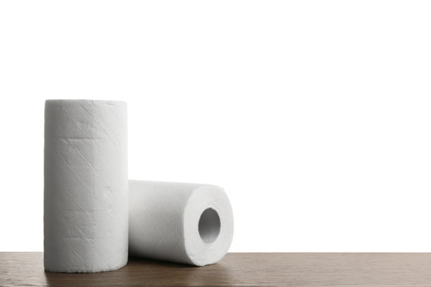 木桌上有一卷卷的纸巾图片下载