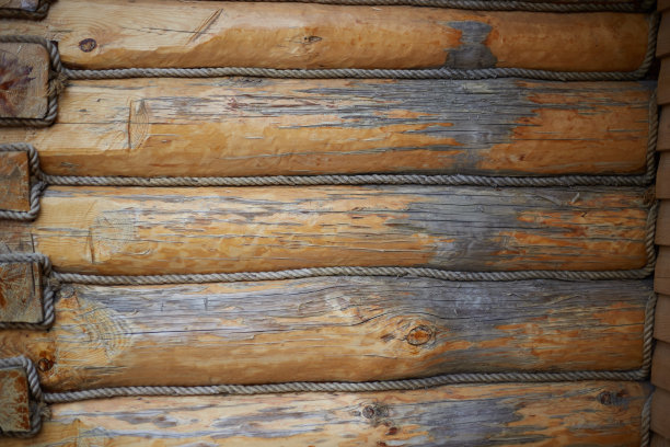 照片墙采用原木老建筑肌理，背景为设计图片下载