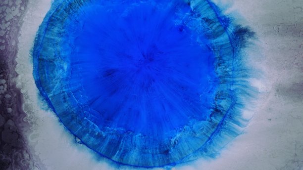 抽象彩色背景的铺展花。一个独特的屏幕保护图片。的背景图片。丙烯酸涂料。酒精墨水。图片下载