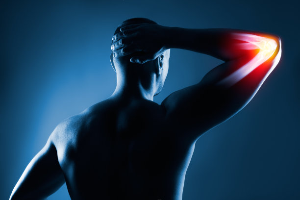 蓝色背景下x光透视人体肘关节图片下载