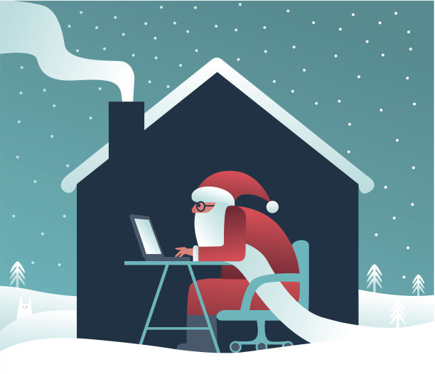 圣诞老人坐在他工作室的笔记本电脑前。图片下载