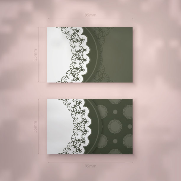 深绿色的名片模板与复古的白色饰品为您的个性。图片下载