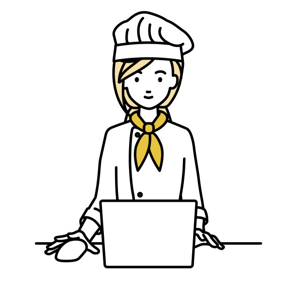 一个女厨师在她的桌子上使用笔记本电脑图片下载