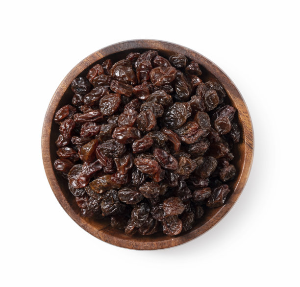 放在白色背景上的葡萄干。图片下载