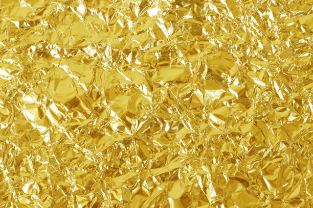 金箔叶光泽质感，抽象的黄色包装纸为背景和设计艺术作品。图片下载