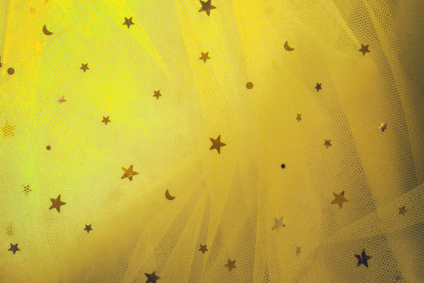 软焦点织物黄色亮片。图片下载