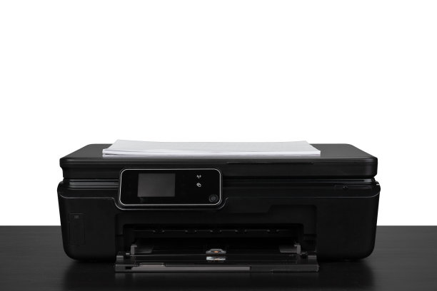 桌上的激光家用打印机对白色背景图片下载