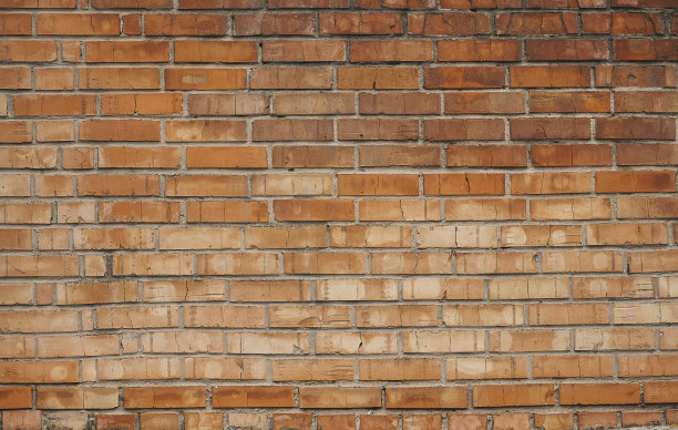 老橘色砖墙，红砖，老垃圾石壁纹理。现代风格复古砖质感图片下载