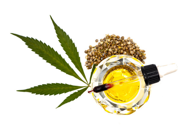 CBD油碗，里面有大麻油，叶子和种子图片下载