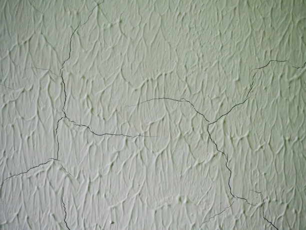 背景-混凝土上的干裂油漆带有小插图，呈绿色图片下载
