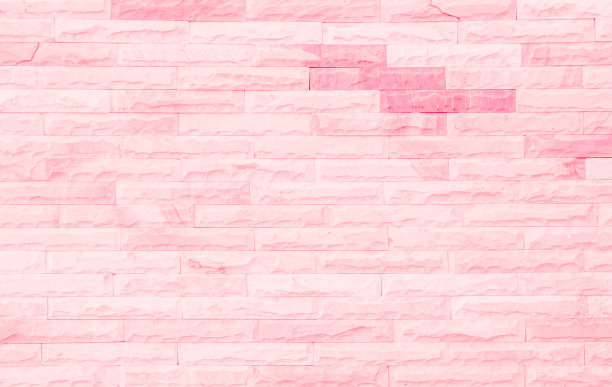 空粉色砖墙纹理的背景在卧室中显得可爱。砖砌石雕室内，岩石旧净混凝土网格凹凸不平抽象风化砖设计，水平建筑墙纸。图片下载
