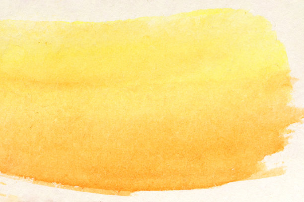 黄色油漆笔画的特写。白色背景上的水彩斑点图片下载