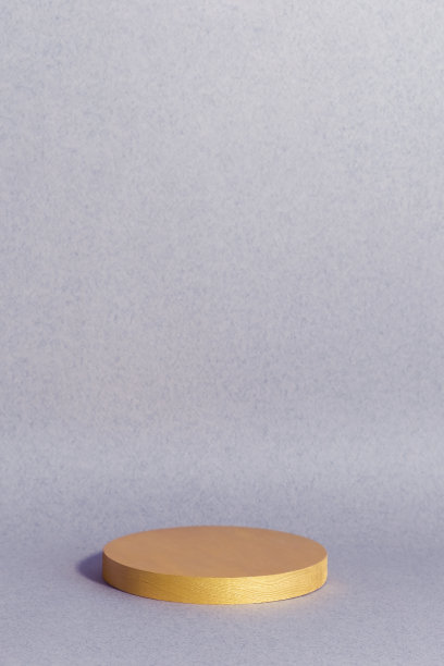 Premium podium为介绍一个化妆品产品。紫色背景下的金色场景图片下载