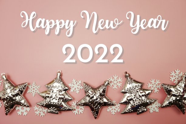在粉红色的背景上祝2022年新年快乐图片下载