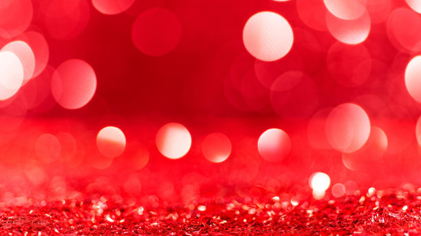 离焦的圣诞红色灯光背景图片下载