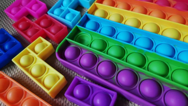 儿童玩具放松推Pop坐立不安玩具股票图片图片下载