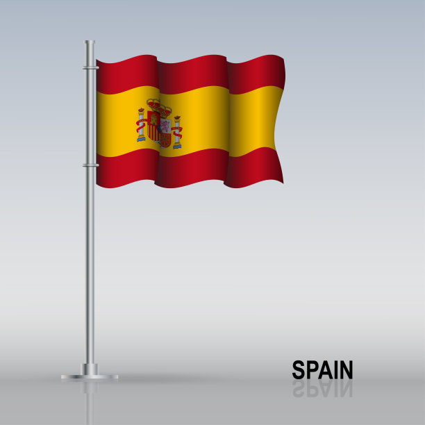 桌上立着旗杆上飘扬的西班牙国旗图片下载
