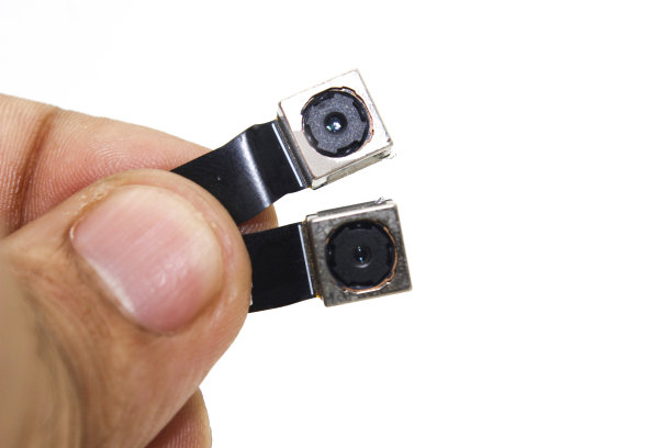 移动相机在白色背景与选择性聚焦图片下载