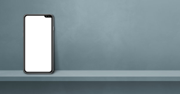 灰色的墙架上放着手机。背景横幅图片下载
