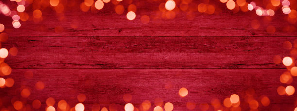 框架的灯光焦黄金色的闪光，孤立在乡村抽象的红色木制纹理新年除夕节日西尔维斯特新年晚会圣诞喜庆的背景图片下载
