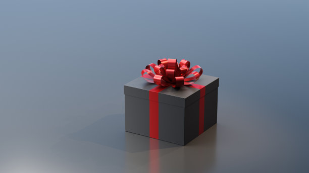 黑色礼品盒与红色丝带，在蓝灰色的背景图片下载