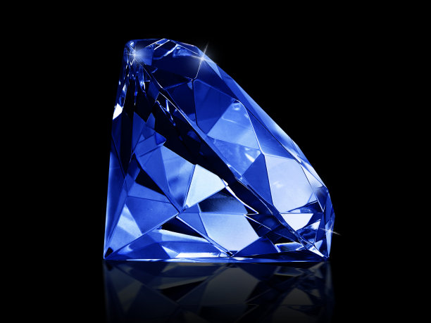 耀眼的钻石蓝色的宝石在黑色的背景图片下载