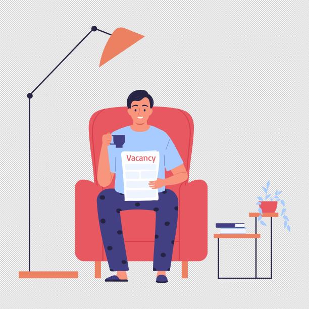 男人沙发喝水看报纸图片下载