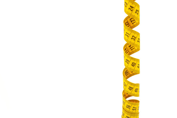黄色螺旋卷尺，隔离在白色背景上。图片下载