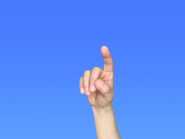 一个男人的右手试图推什么东西。图片下载