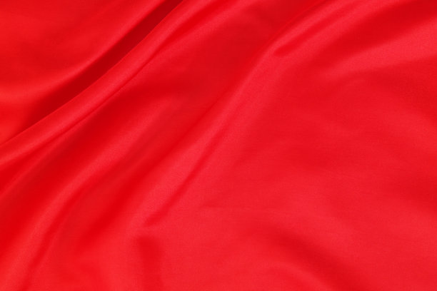 红色绸缎或丝绸背景。图片下载
