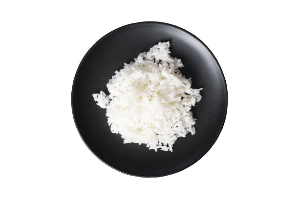 上图为白色盘子上的米饭。图片下载