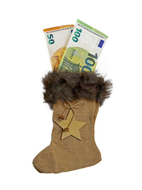 棕色黄麻圣诞靴与欧洲钞票孤立在白色的背景图片下载