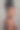 一个迷人的年轻女子在灰色背景上涂抹润肤霜的工作室镜头图片下载